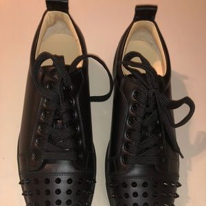 Women Christian Louboutin spiked tennis shoes